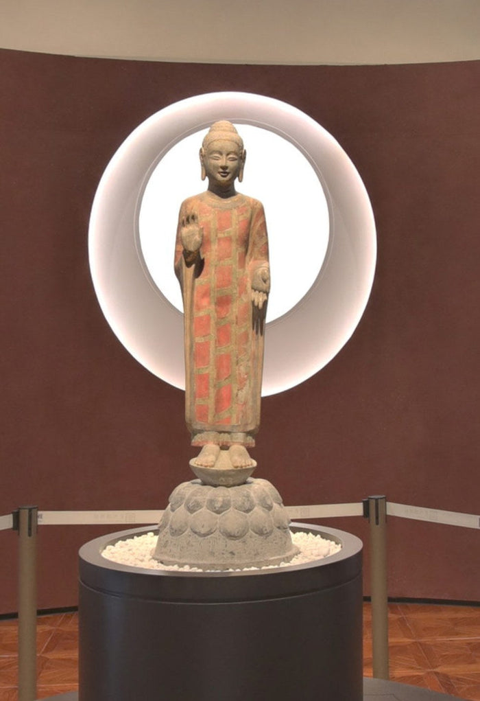 Standing Buddha with remnants of polychrome and gilding, Northern Qi dynasty (550-577), Longxing Temple hoard, Qingzhou, displayed at the Qingzhou Museum