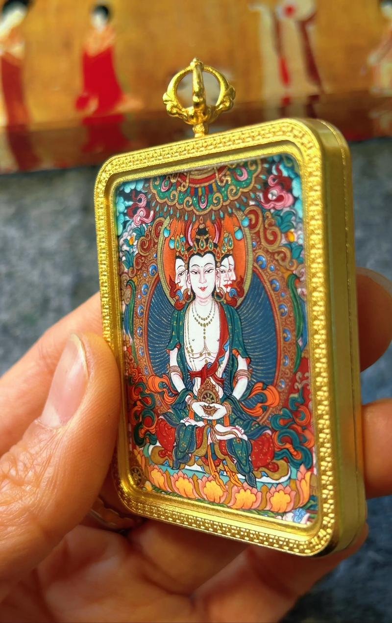 Side view of the copper gau case with the hand-painted thangka miniature inside